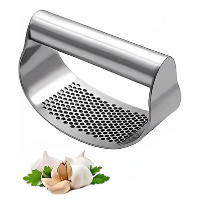 Stainless steel garlic press with garlic cloves on a white background
