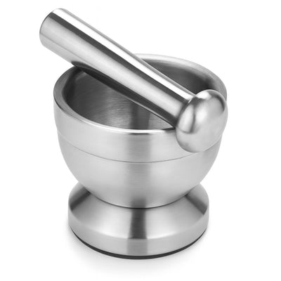 Stainless steel mortar and pestle on a white background