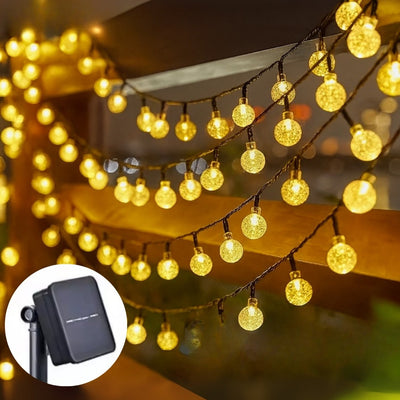 String of decorative lights with a close-up inset of a control device.