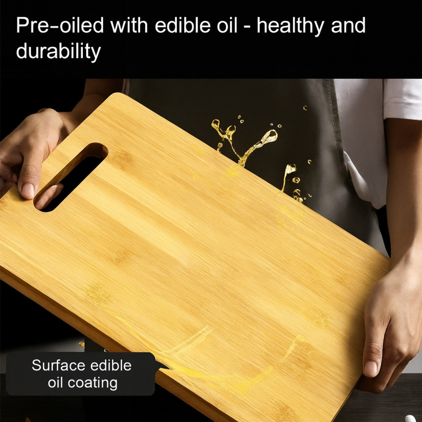 Wooden cutting board with a hand holding it, showing edible oil coating.
