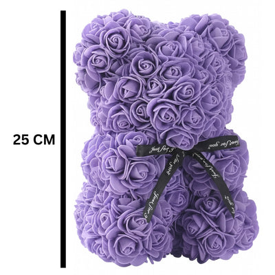 Purple rose teddy bear with a black ribbon and measurement label on a white background